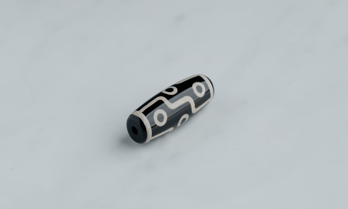 Black and white Tibetan Dzi beads.