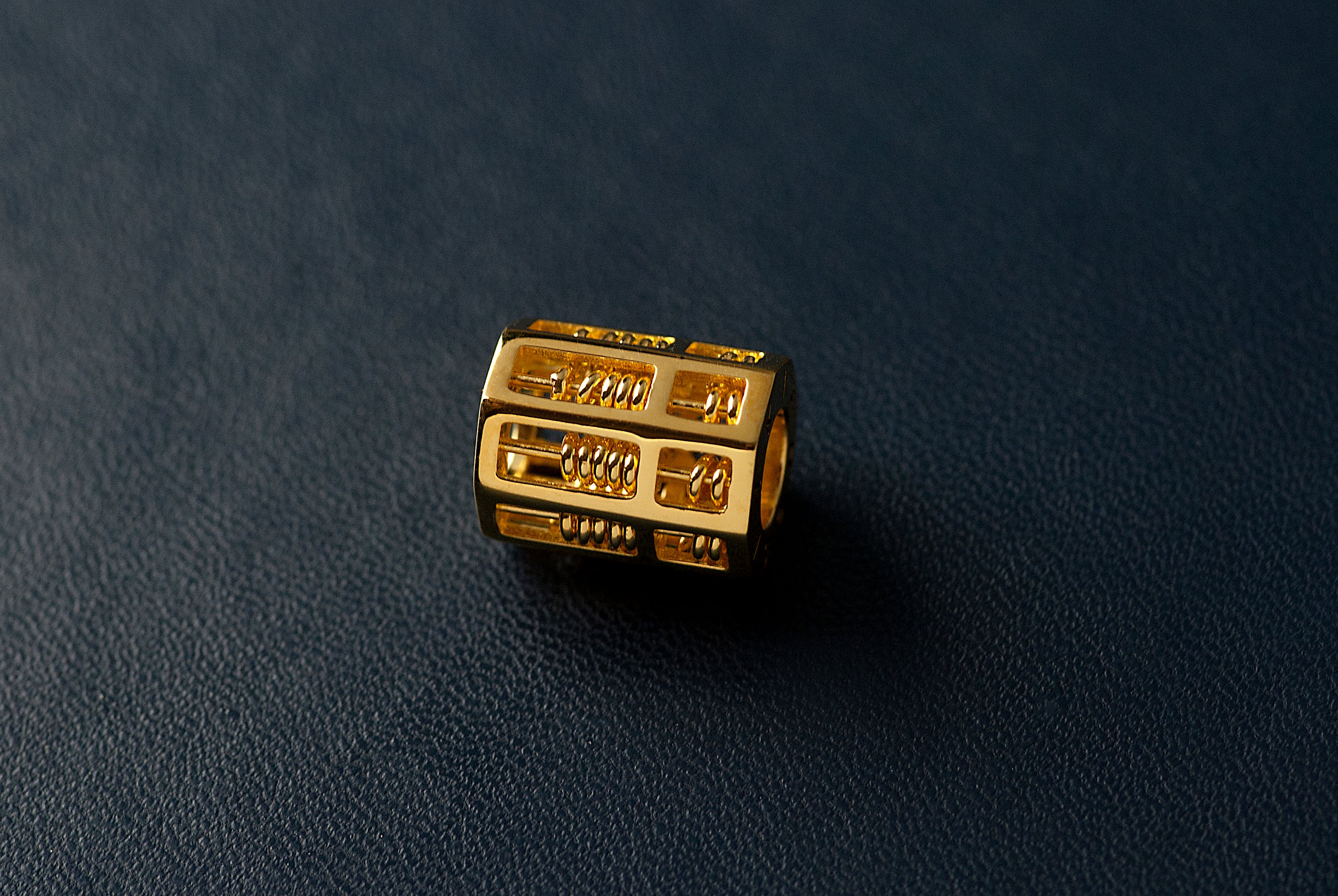 An abacus bracelet—a symbol of knowledge, wisdom, and economic prosperity.